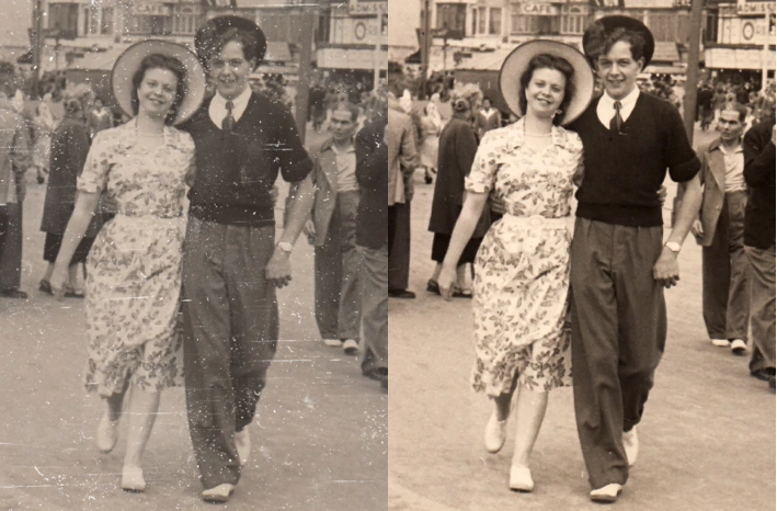 A damaged and restored vintage photograph of a smiling young couple.