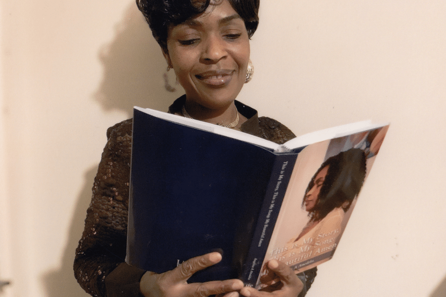 LifeBook author Angelina Amedeka with her private autobiography, My Beautiful Amen.