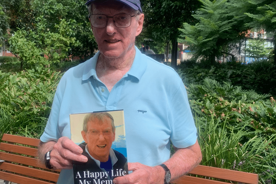 LifeBook author Ross Parker holding his private autobiography.